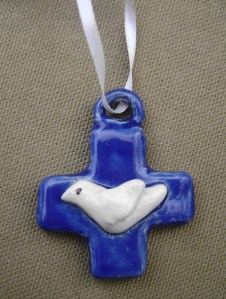 Mini blue chunky cross with a dove