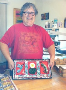 Proud Karyn with her trio tile mosaic wall piece!