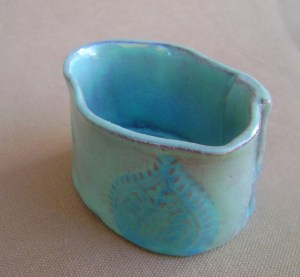 Small bowl  teal and Turquoise glaze with tear drop stamp design
